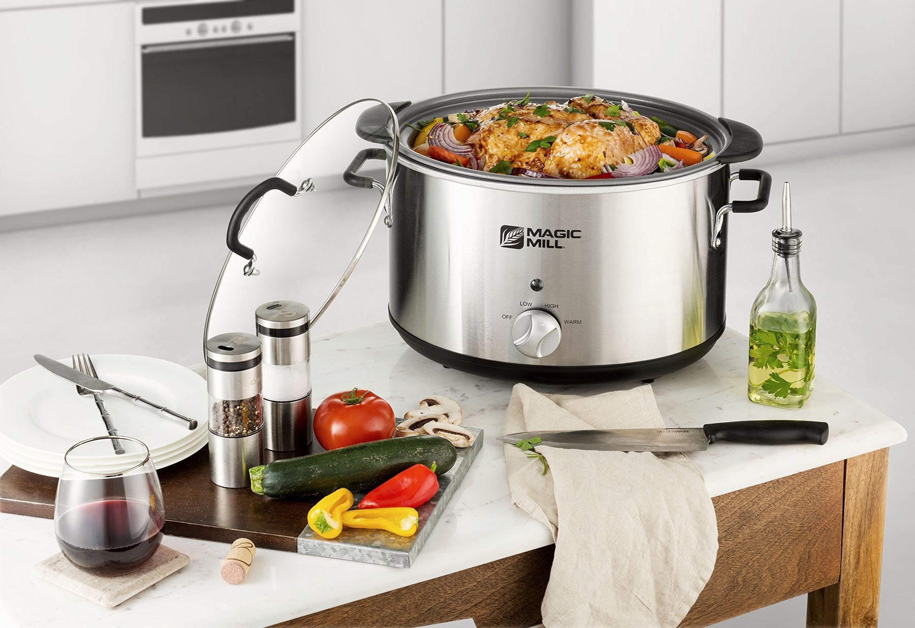 MAGIC MILL 12 QT black SLOW COOKER WITH FLAT GLASS COVER AND COOL TOUCH  HANDLES MODEL# MSC1225